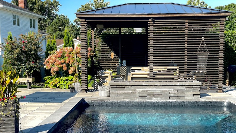 How Can I Add Shade and Privacy to My Backyard Pool Pavilion?
