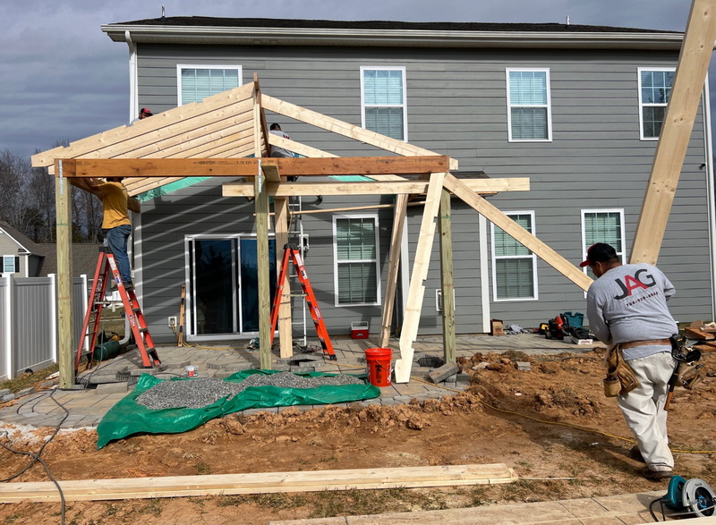 How Do You Attach A Covered Patio To An Existing House?